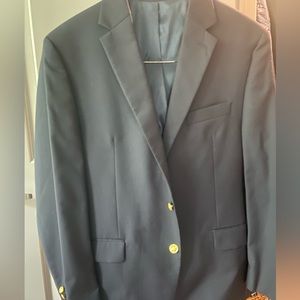 Navy Blue men’s blazer with gold buttons. Size 42R with a single vent in back.